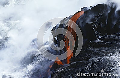 USA Hawaii Big Island Volcanos National Park cooling lava and surf Stock Photo