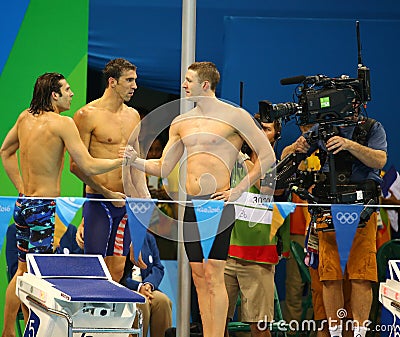 USA Men's 4x100m medley relay team Cory Miller (L), Michael Phelps and Ryan Murphy celebrate victory Editorial Stock Photo