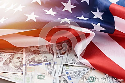 USA national flag and the currency usd money banknotes. Business and finance concept Stock Photo