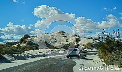 car rides the harms of sand dunes from gypsum to White Sands National Monument, New Mexico, USA Editorial Stock Photo