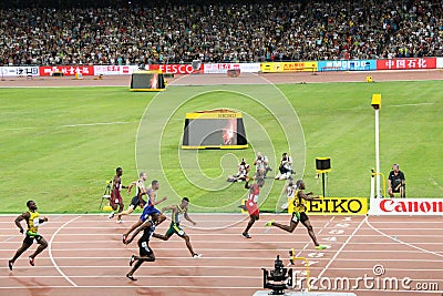 Usain Bolt powering to the finish line to win 200 metres title at the IAAF World Championships Beijing 2015 Editorial Stock Photo