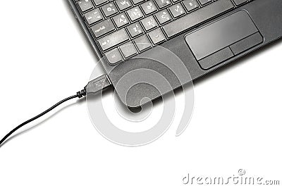 Usb cable and laptop Stock Photo