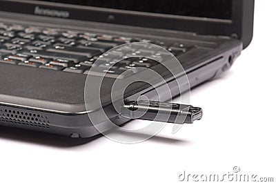 USB flash drive inserted into the laptop Stock Photo