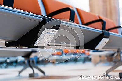 USB sockets in the seats in the airport lounge Stock Photo