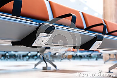 USB sockets in the seats in the airport lounge Stock Photo