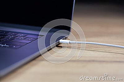 USB Type C Port Cable for fast charging laptop. Close up photo Stock Photo