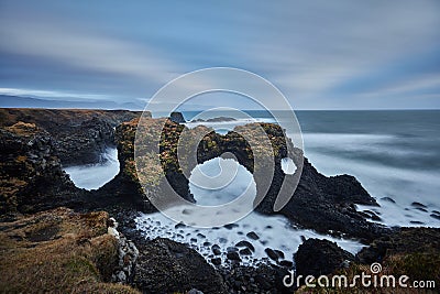 Use Slow Shutter Speed To Shoot the West Coastline of Iceland in Winter Stock Photo