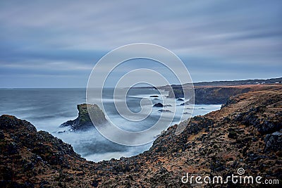 Use Slow Shutter Speed To Shoot the West Coastline of Iceland in Winter Stock Photo