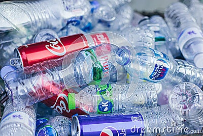 Used aluminium Can and drinking water plastic bottle garbage waste collected sale for recycle Editorial Stock Photo