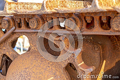 A close up of ruster caterpillar tracks on a dozer Stock Photo