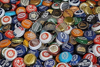 Used Beer Bottle Caps from Numerous International Brands Editorial Stock Photo