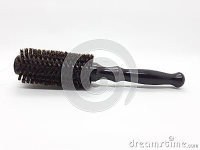 Used Black Brown Hair Comb with Woman Hairs in White Isolated background 01 Stock Photo