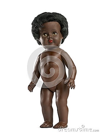 Used black doll in front of a white background Stock Photo