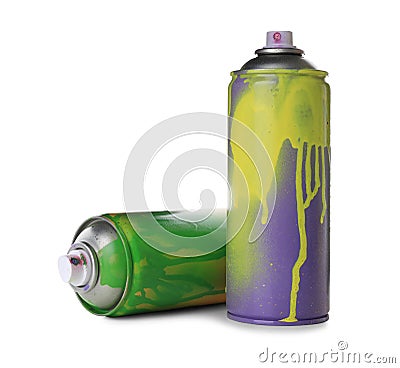 Used cans of spray paints on white background. Graffiti supplies Stock Photo