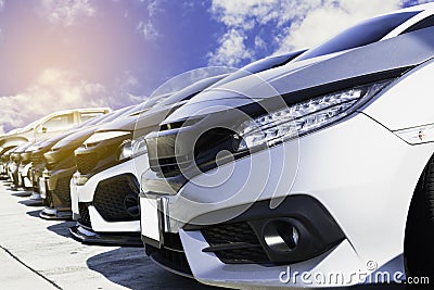 Used cars, parked in the parking lot of Dealership waiting to be sold and delivered to customers and waiting for the auction with Stock Photo
