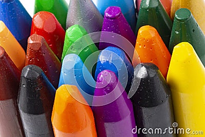 Used colored wax crayons or pencils for drawing or decorating close-up Stock Photo