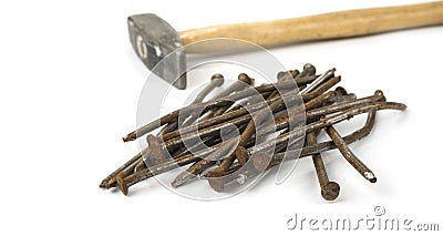 Used crooked rusty nailes on a white. Perseverance and strength Stock Photo