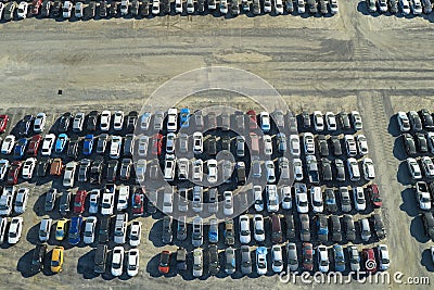 Used damaged cars on auction reseller company big parking lot ready for resale services. Sales of secondhand vehicles Stock Photo