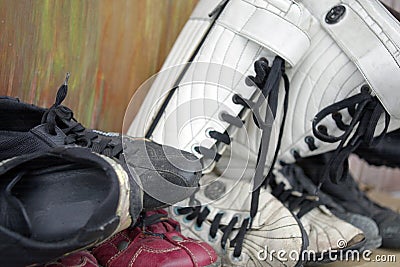 Used footwear in mess Stock Photo