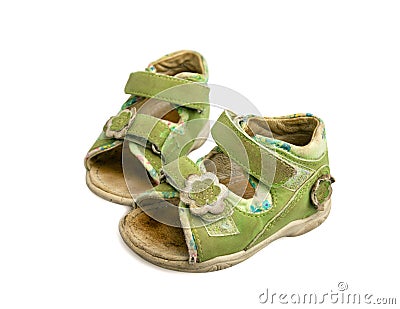 Used green child sandals isolated Stock Photo