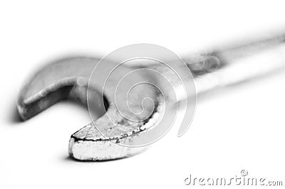 Used old wrench closeup isolated white background Stock Photo