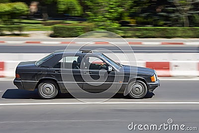 Panning car on the street. Mercedes Benz 190 Editorial Stock Photo