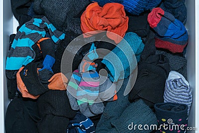 Used sock in wood tray ,man and women socks in an open drawer, w Stock Photo