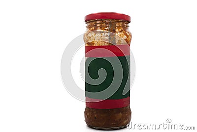 Used South Indian spicy pickled in red chilly and oil packed in a jar Stock Photo