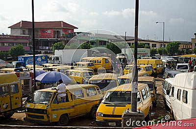 Used Taxi vehicles for sale at the market in Oshodi Editorial Stock Photo