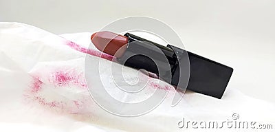 On a tissue, lipstick leaves a picture of lips Stock Photo