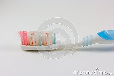 Used toothbrush isolated on white background Stock Photo