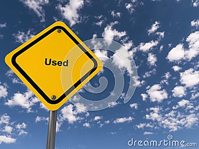 used traffic sign on blue sky Stock Photo