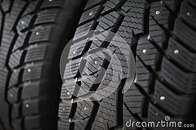 Used winter tire protector with studs Stock Photo