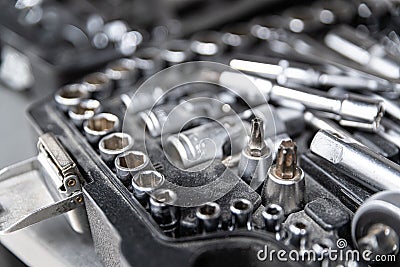 Dirty used wrench and tools in mechanic tool box Stock Photo