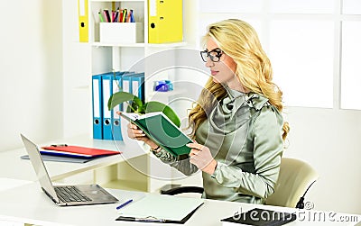 Useful information. receptionist work on reception. female business leader. woman sit at desk in office. Business woman Stock Photo