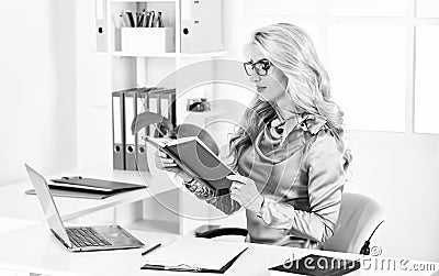 useful information. receptionist work on reception. female business leader. woman sit at desk in office. Business woman Stock Photo