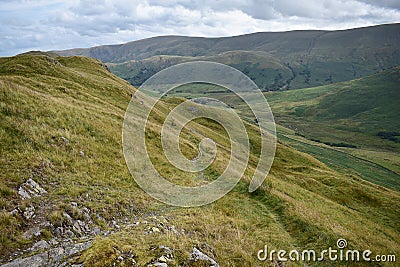 Path running down to Bannerdale from Beda Fell, Lake District Stock Photo