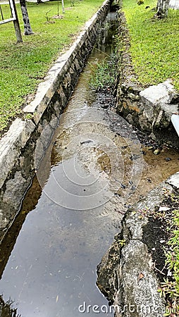 Usefull drainage where rainwater is channeled Stock Photo