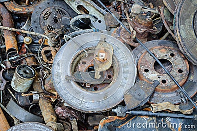 Useless, worn out rusty brake discs and other parts Stock Photo