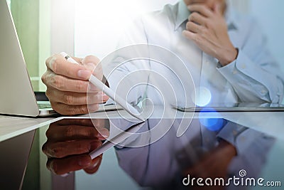 usiness concept.Businessman working stock exchange project modern office.Laptop computer digital table and smart phone.Internet c Stock Photo