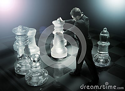 Usinessman on a chessboard as a dummy Stock Photo