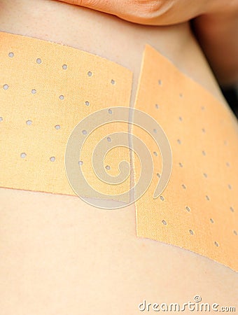 Using chinese rheumatism plaster Stock Photo