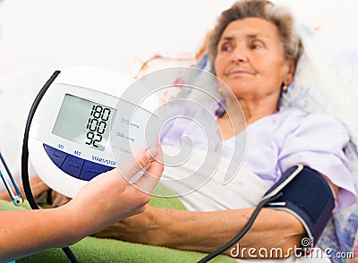 Using Digital Blood Pressure Gauge Stock Photo