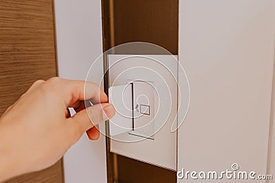 Using electronic card key for access Stock Photo