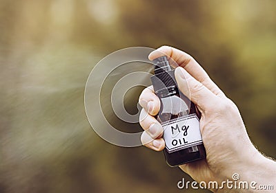 Using Magnesium Oil providing the body with sufficient magnesium vitamin. Stock Photo