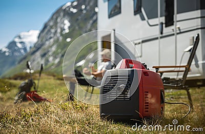 Using Portable Gasoline Inverted Generator While Dry Camping Stock Photo