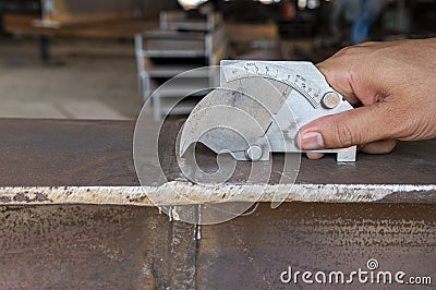 Using the welding gauge to measure the Convexity And Weld Reinforcement of the welded Stock Photo