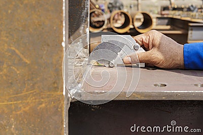 Using the Welding Gauge to Measure the Convexity And Weld Reinforcement on Welded Stock Photo