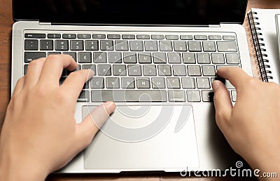 Using your fingers on the keyboard to enter data or control a computer is an important and versatile way, such as typing text, Stock Photo