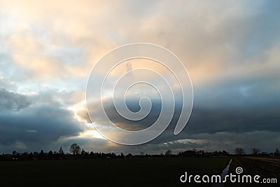 Dusk dramatic clouded sunset sky Stock Photo